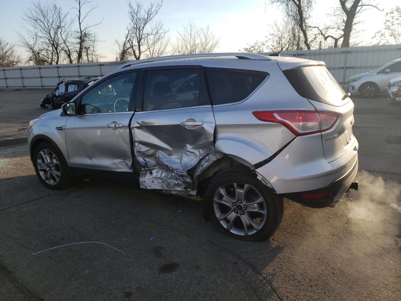 Obraz 2 z 2015 FORD ESCAPE TITANIUM 2015 z VIN 1FMCU9J91FUA05501