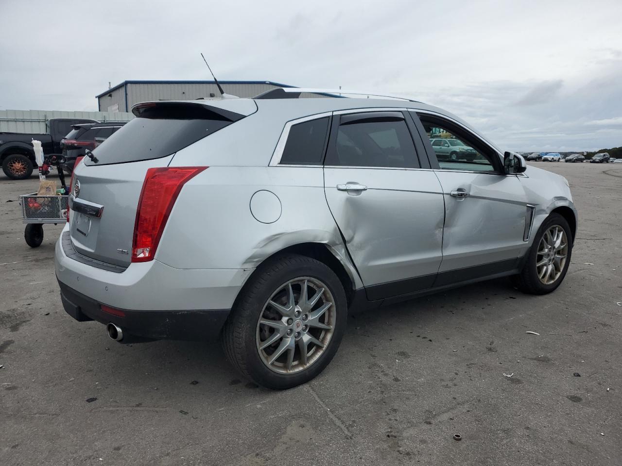 Obraz 3 z 2014 CADILLAC SRX PREMIUM COLLECTION 2014 z VIN 3GYFNGE31ES608580