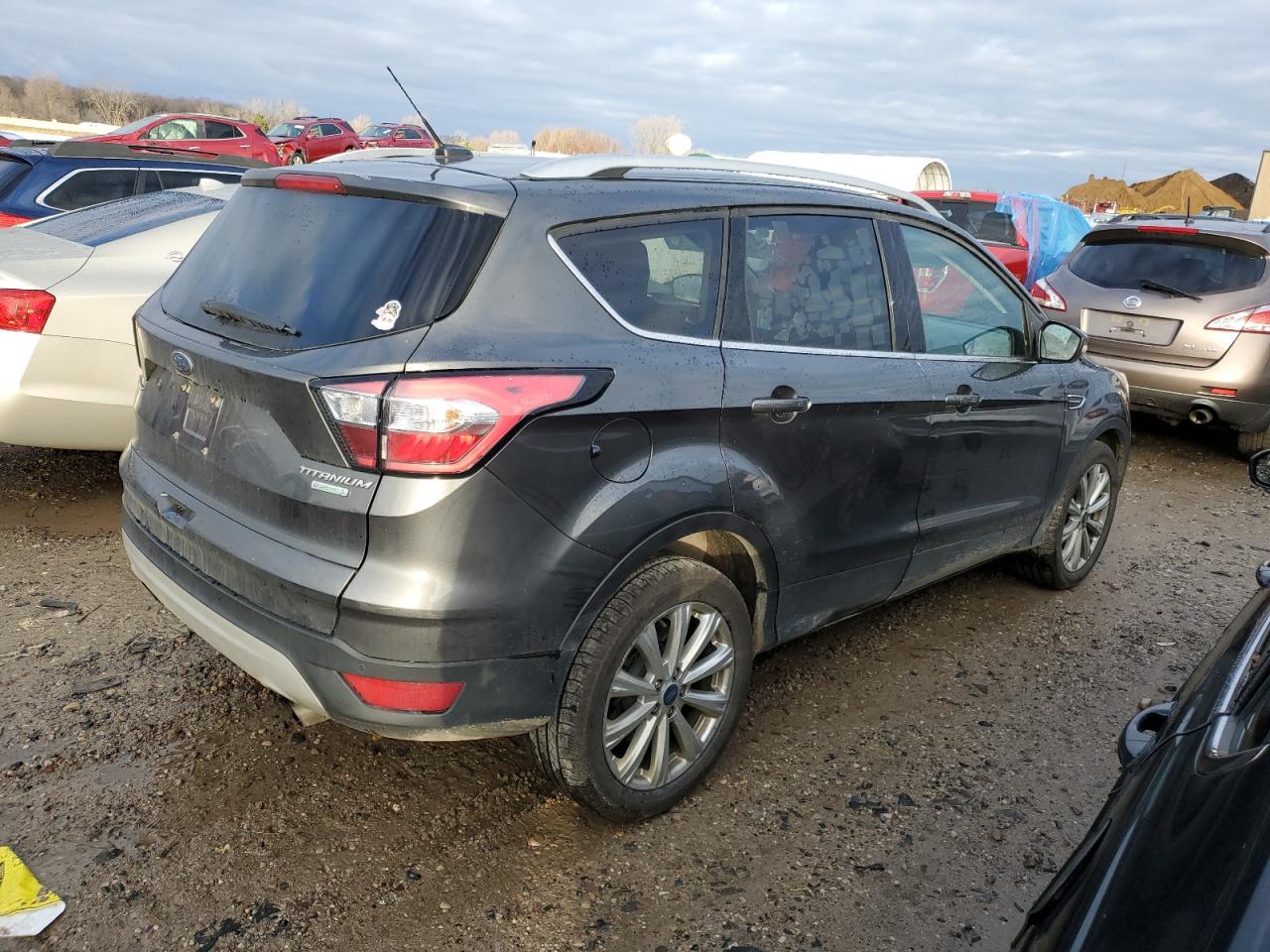 Изображение 3 2017 FORD ESCAPE TITANIUM 2017 с VIN 1FMCU0JD6HUE33647