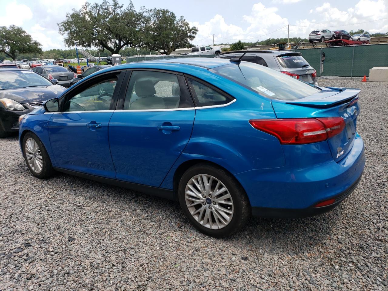 Image 2 of 2017 FORD FOCUS TITANIUM 2017 with VIN 1FADP3J27HL212960