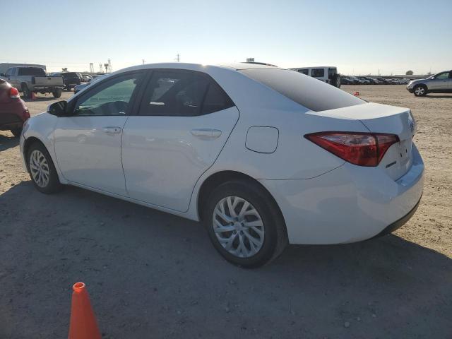 Изображение 2 2019 TOYOTA COROLLA L 2019 с VIN 5YFBURHE5KP897620