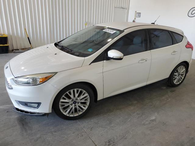 Image 1 of 2016 FORD FOCUS TITANIUM 2016 with VIN 1FADP3N20GL287881