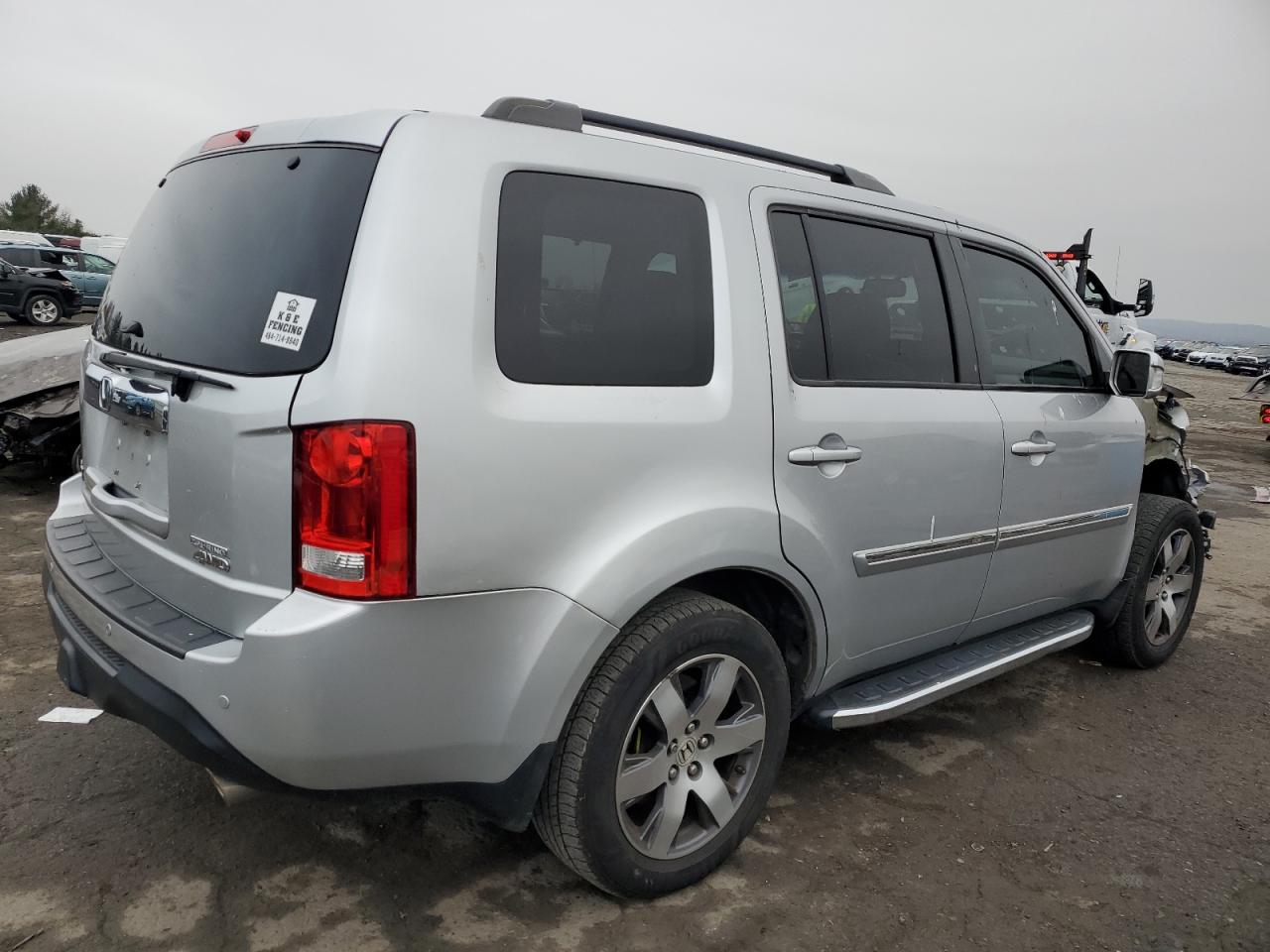 Изображение 3 Honda Pilot Touring 2012 с VIN 5FNYF4H98CB039176