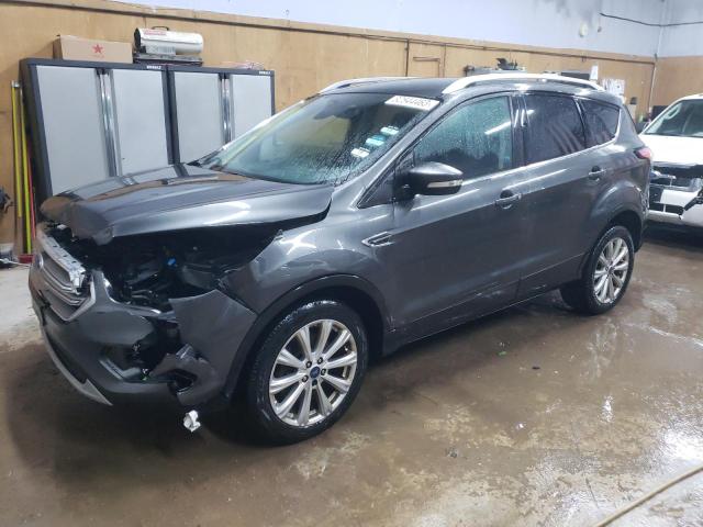 Image 1 of 2017 FORD ESCAPE TITANIUM 2017 with VIN 1FMCU9J97HUB75476