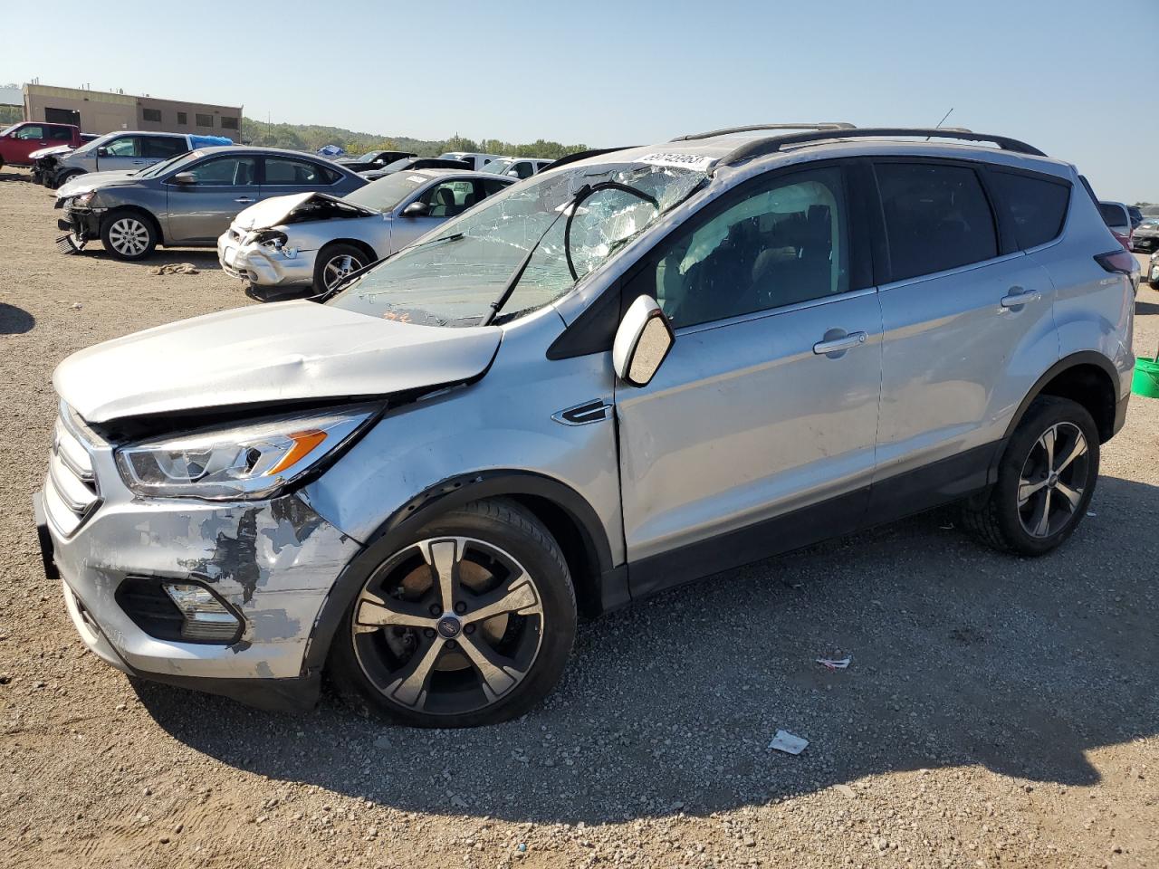 Obraz 1 z 2017 FORD ESCAPE SE 2017 z VIN 1FMCU9G91HUB89719