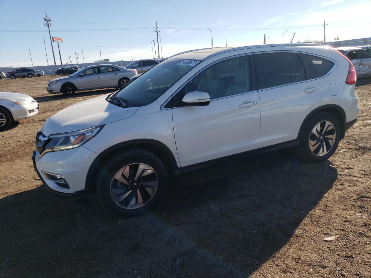 Obraz 1 z 2016 HONDA CR-V TOURING 2016 z VIN 5J6RM4H94GL027159