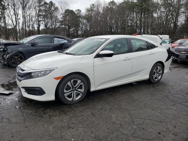 Obraz 1 z 2018 HONDA CIVIC LX 2018 z VIN 19XFC2F58JE023504