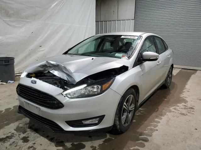 Image 1 of 2017 FORD FOCUS SE 2017 with VIN 1FADP3FE0HL305578