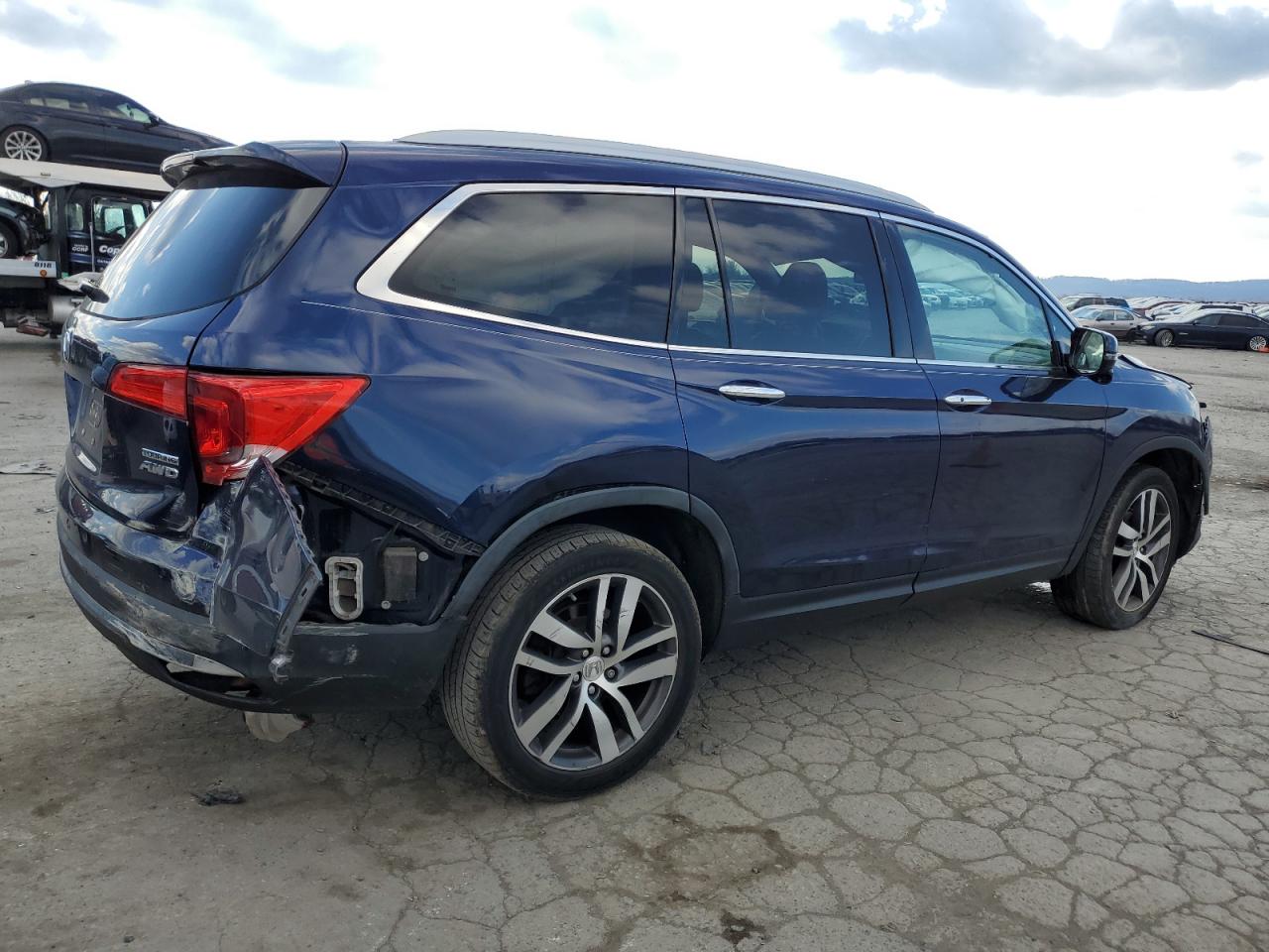 Изображение 3 2016 HONDA PILOT TOURING 2016 с VIN 5FNYF6H97GB039137
