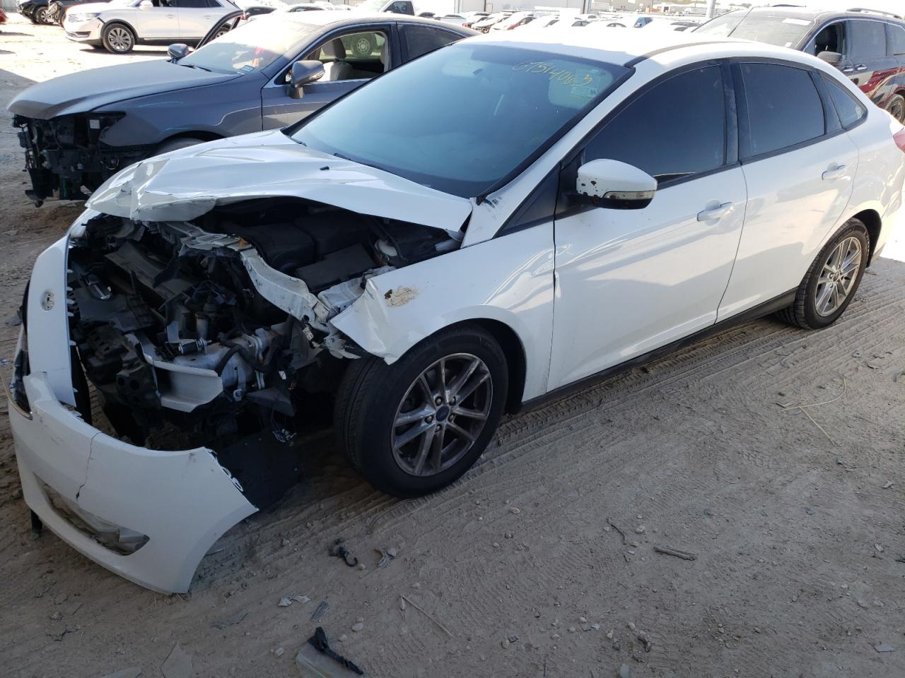 Изображение 1 2017 FORD FOCUS SE 2017 с VIN 1FADP3F22HL300016