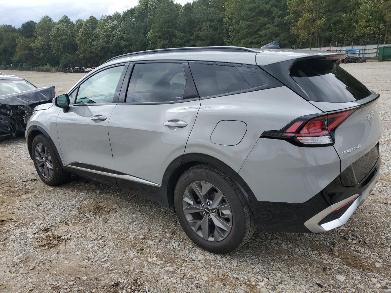 Изображение 2 2023 KIA SPORTAGE SX 2023 с VIN 5XYK43AF2PG071173