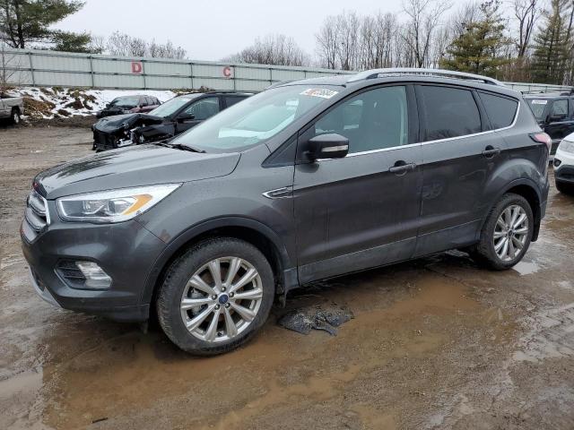 Obraz 1 z 2017 FORD ESCAPE TITANIUM 2017 z VIN 1FMCU9J97HUB42171