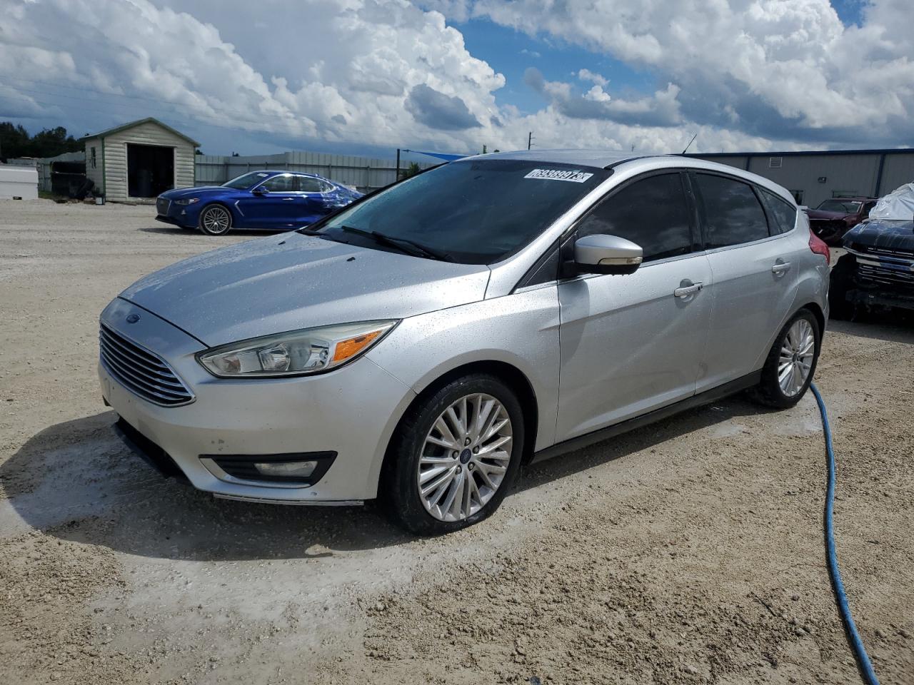 Obraz 1 z 2015 FORD FOCUS TITANIUM 2015 z VIN 1FADP3N25FL229120