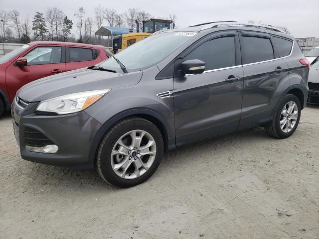Obraz 1 z 2015 FORD ESCAPE TITANIUM 2015 z VIN 1FMCU9J92FUC44863