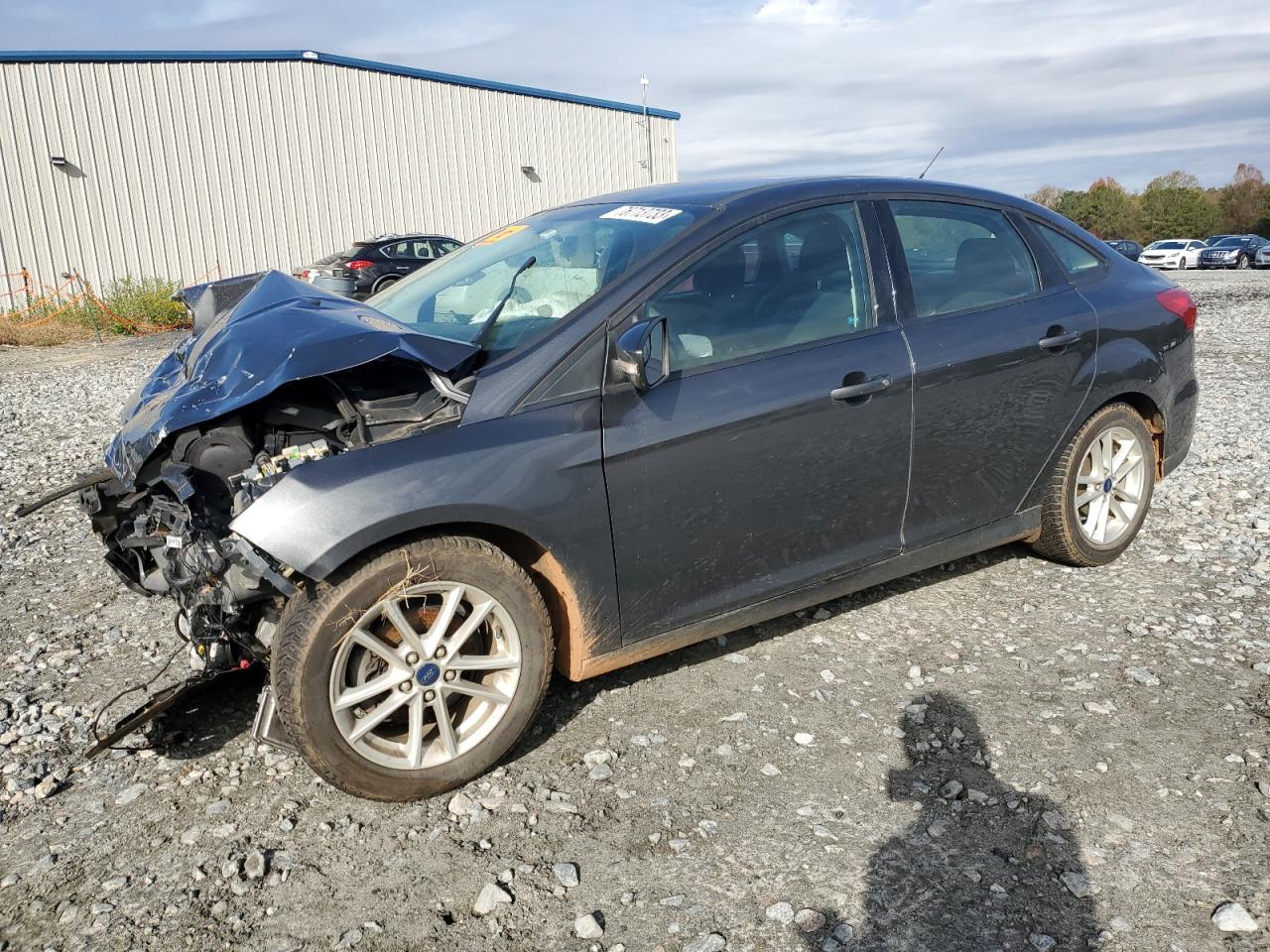 Obraz 1 z 2016 FORD FOCUS SE 2016 z VIN 1FADP3F28GL403262