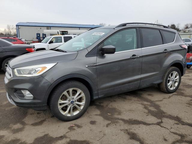 Image 1 of 2017 FORD ESCAPE SE 2017 with VIN 1FMCU9GD2HUD25098