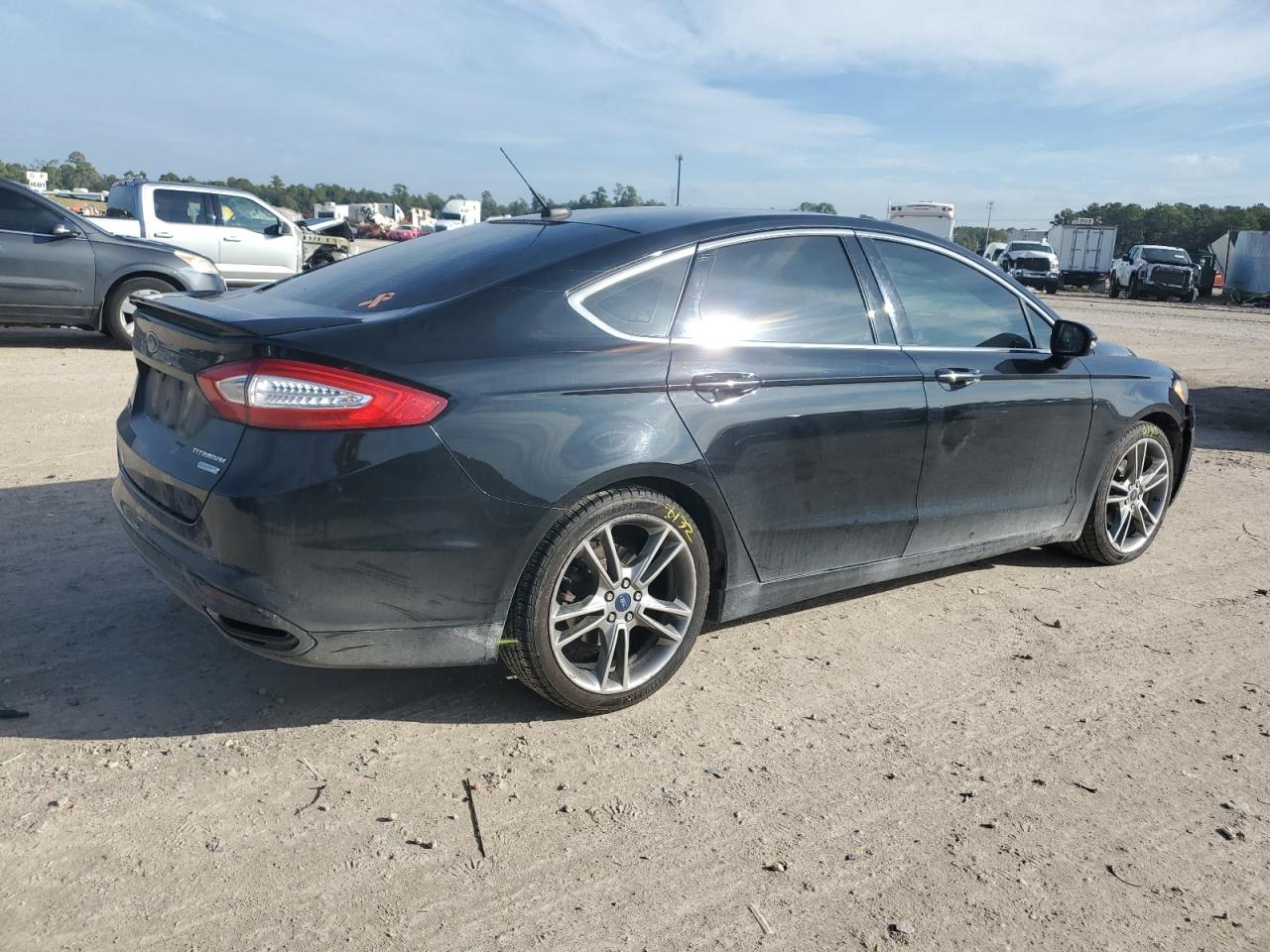 Image 3 of 2016 FORD FUSION TITANIUM 2016 with VIN 3FA6P0K99GR186378