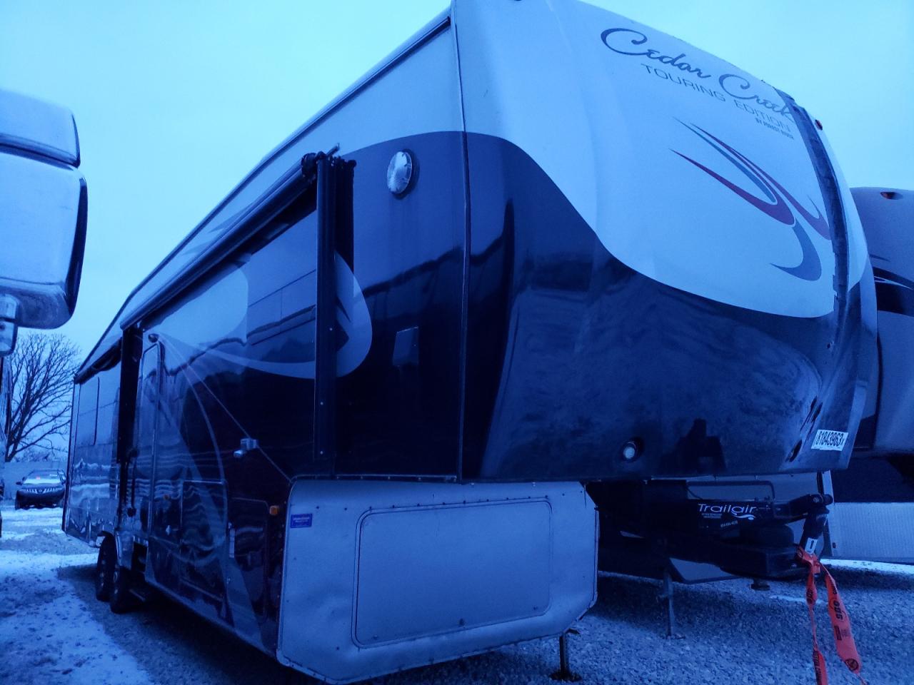 Image 1 of 2011 WILDWOOD CEDARCREEK 2011 with VIN 4X4FCRM2XRS204498