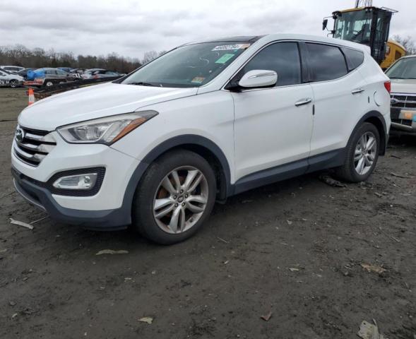 Obraz 1 z 2013 HYUNDAI SANTA FE SPORT  2013 z VIN 5XYZWDLA9DG038179