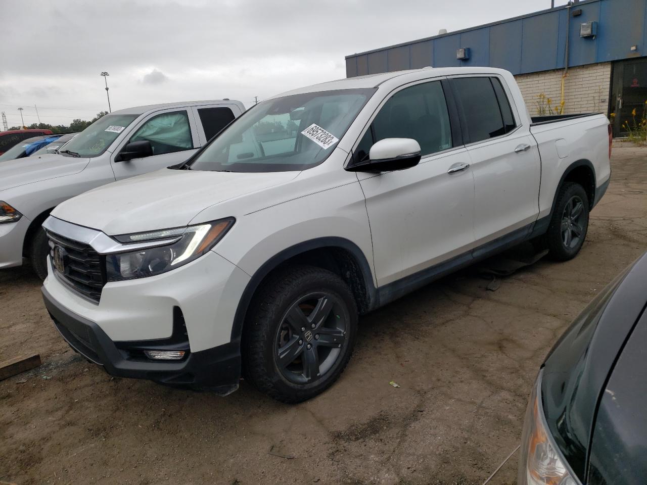 Image 1 of 2023 HONDA RIDGELINE RTL-E 2023 with VIN 5FPYK3F77PB004875