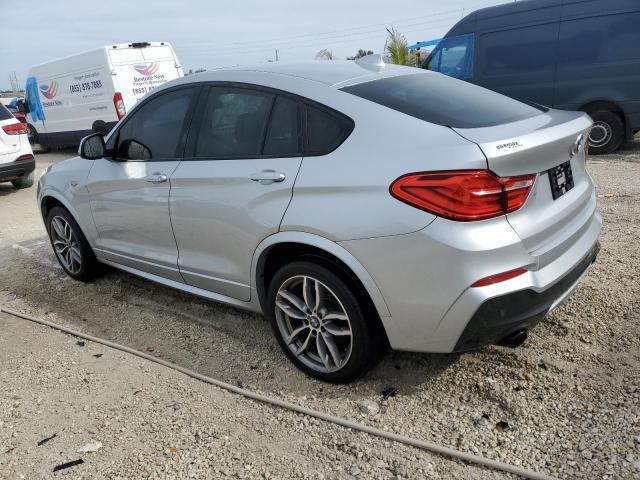Obraz 2 z 2018 BMW X4 XDRIVEM40I 2018 z VIN 5UXXW7C54J0W64525
