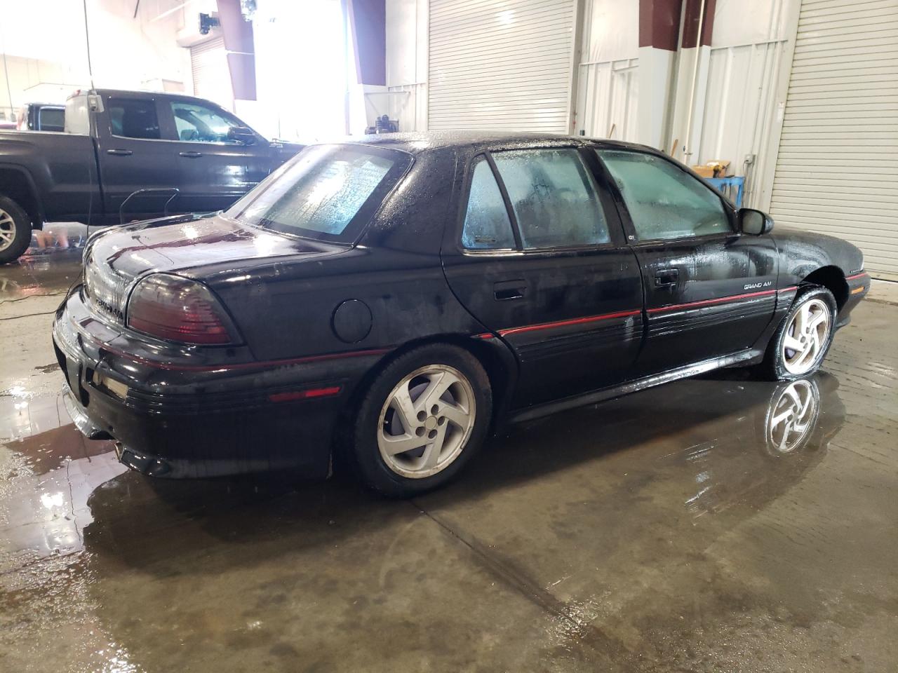 Image 3 of 1993 PONTIAC GRAND AM GT 1993 with VIN 1G2NW54A5PC734912