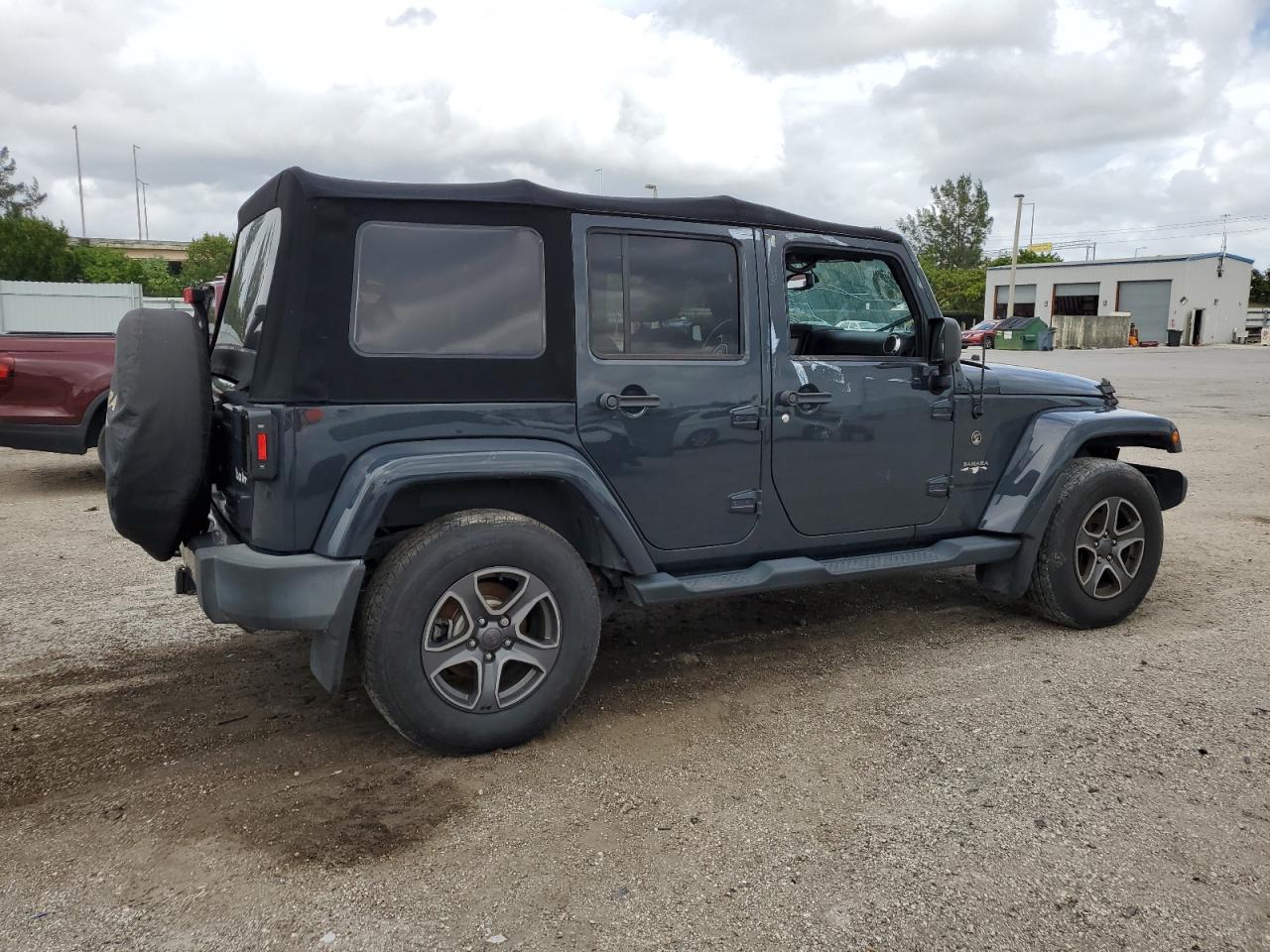 Obraz 3 z Jeep Wrangler Unlimited Sahara 2016 z VIN 1C4BJWEG9GL221992