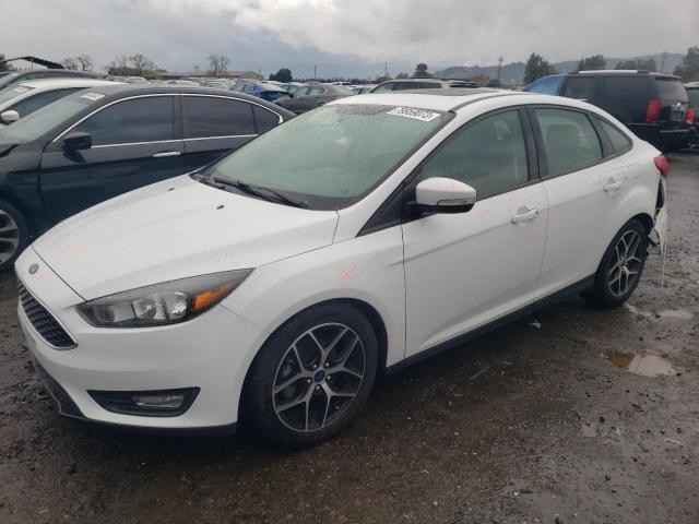 Image 1 of 2017 FORD FOCUS SEL 2017 with VIN 1FADP3H23HL304069