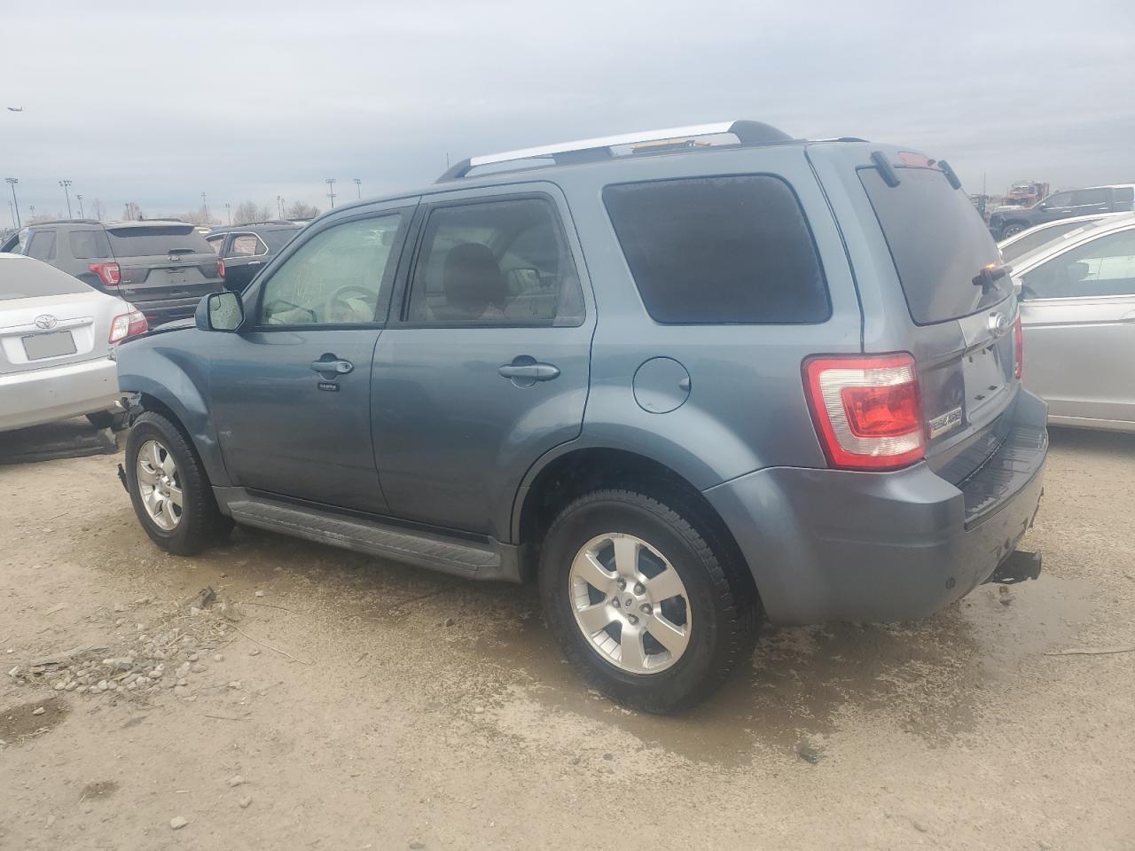 Изображение 2 2010 FORD ESCAPE LIMITED 2010 с VIN 1FMCU0EG7AKD11143