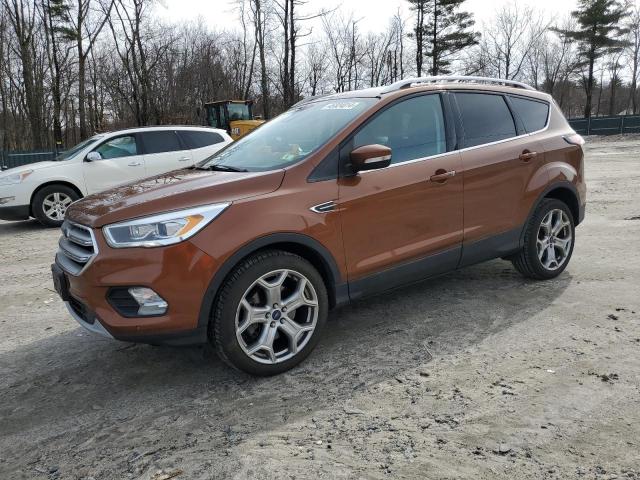 Image 1 of 2017 FORD ESCAPE TITANIUM 2017 with VIN 1FMCU9J91HUA33527