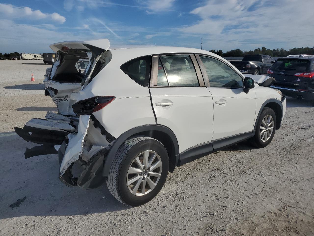 Image 3 of 2015 MAZDA CX-5 SPORT 2015 with VIN JM3KE2BE3F0506744