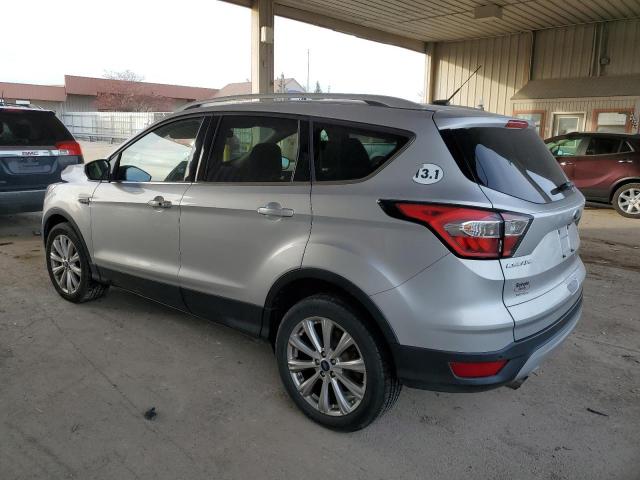Изображение 2 2017 FORD ESCAPE TITANIUM 2017 с VIN 1FMCU9JD2HUC46670