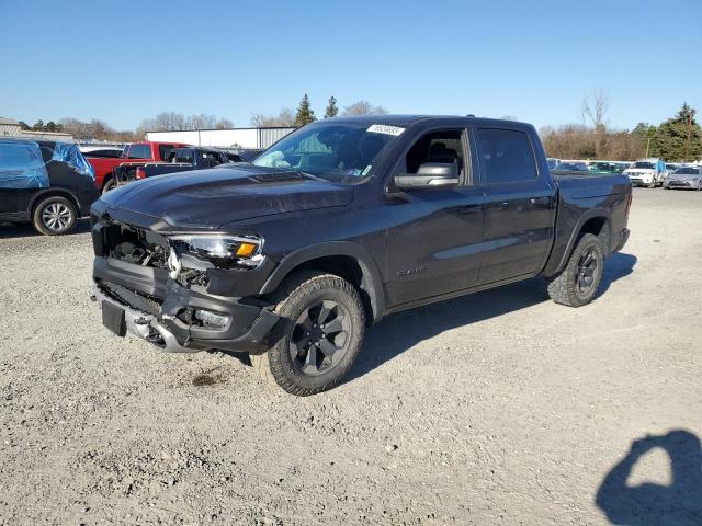 Image 1 of 2019 RAM 1500 REBEL 2019 with VIN 1C6SRFLT2KN874385
