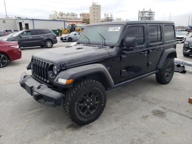 Image 1 of 2021 JEEP WRANGLER UNLIMITED SPORT 2021 with VIN 1C4HJXDN5MW662674