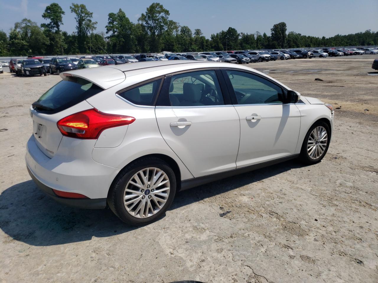 Изображение 3 Ford Focus Titanium 2016 с VIN 1FADP3N23GL222975