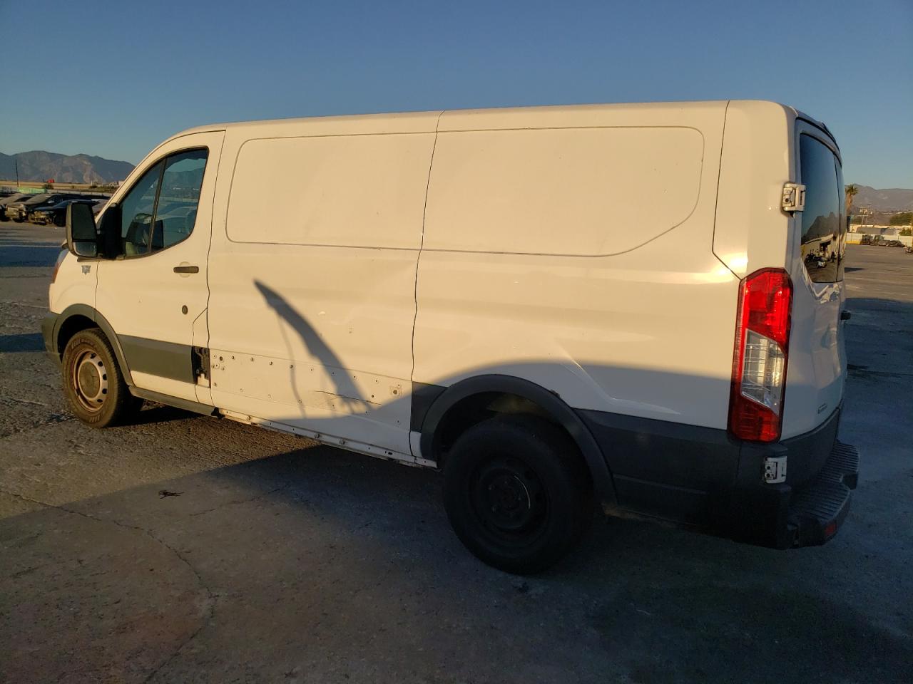 Image 2 of 2015 FORD TRANSIT T-150 2015 with VIN 1FTNE1YGXFKA37035