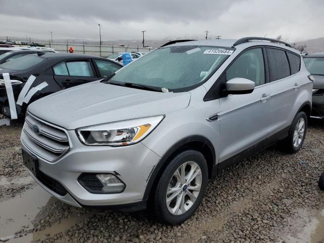 Image 1 of 2018 FORD ESCAPE SE 2018 with VIN 1FMCU9GD5JUC35241