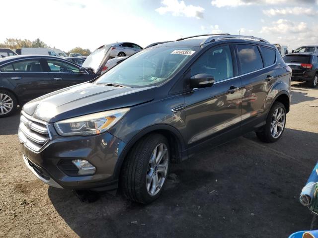 Image 1 of 2017 FORD ESCAPE TITANIUM 2017 with VIN 1FMCU9J90HUF09444