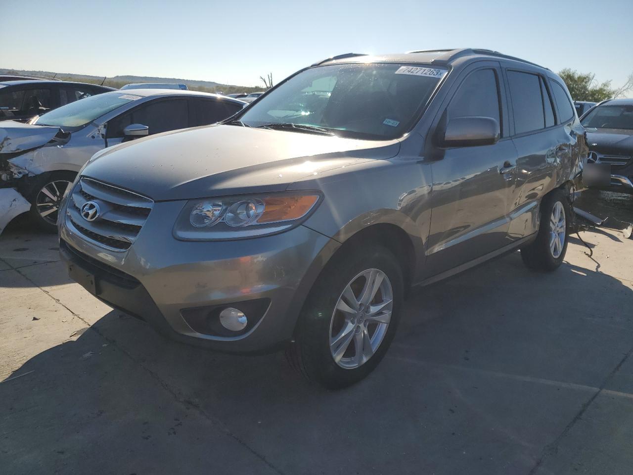 Image 1 of 2012 HYUNDAI SANTA FE SE 2012 with VIN 5XYZH4AG9CG097927