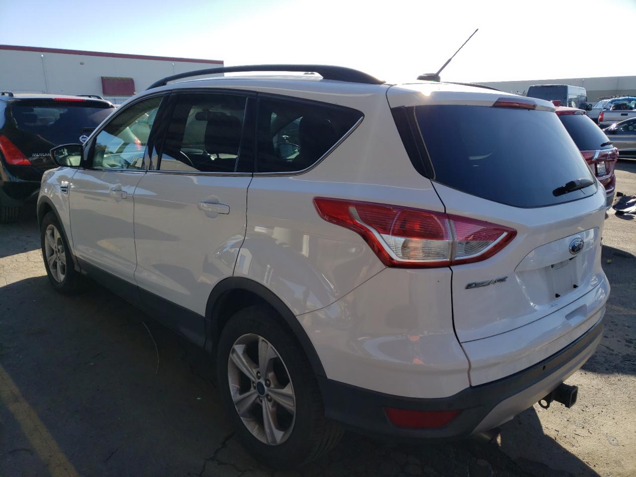 Изображение 2 2016 FORD ESCAPE SE 2016 с VIN 1FMCU9G9XGUC60284