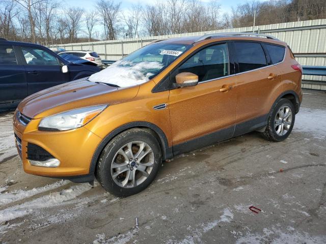 Obraz 1 z 2016 FORD ESCAPE TITANIUM 2016 z VIN 1FMCU9JX8GUC31874