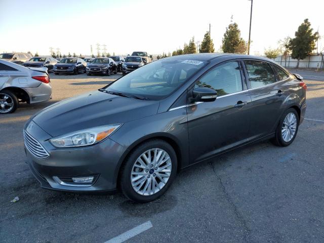 Image 1 of 2018 FORD FOCUS TITANIUM 2018 with VIN 1FADP3J24JL332043