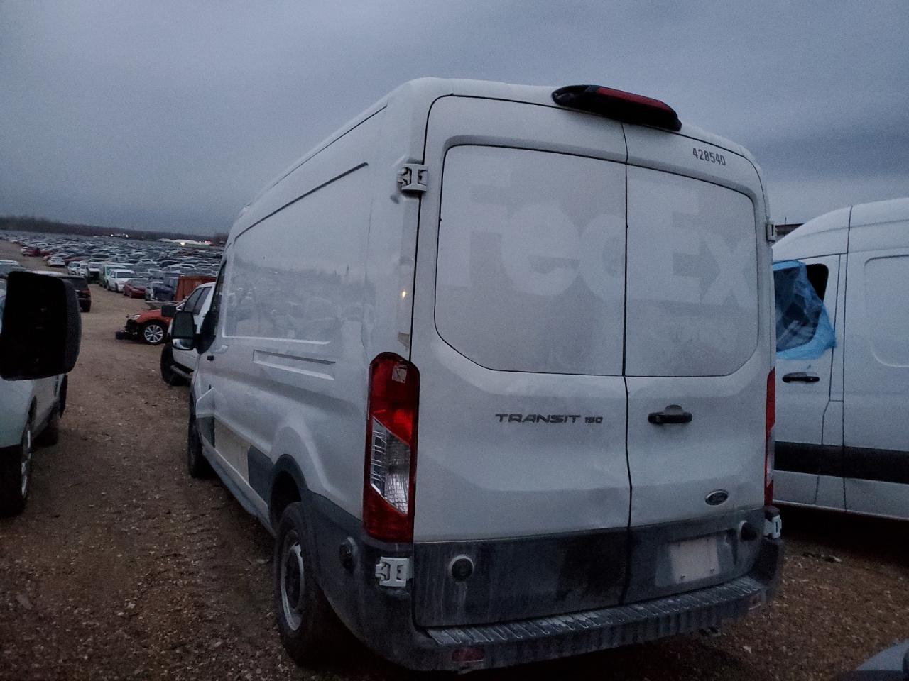 Image 2 of 2019 FORD TRANSIT T-150 2019 with VIN 1FTYE2CM8KKB10381