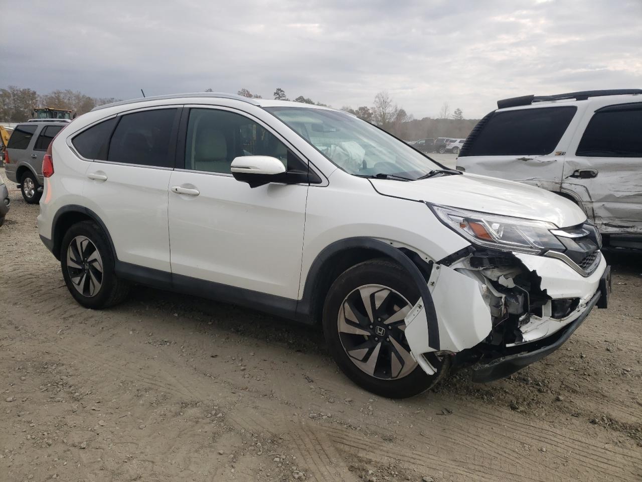 Image 1 of 2016 HONDA CR-V TOURING 2016 with VIN 5J6RM4H94GL105357