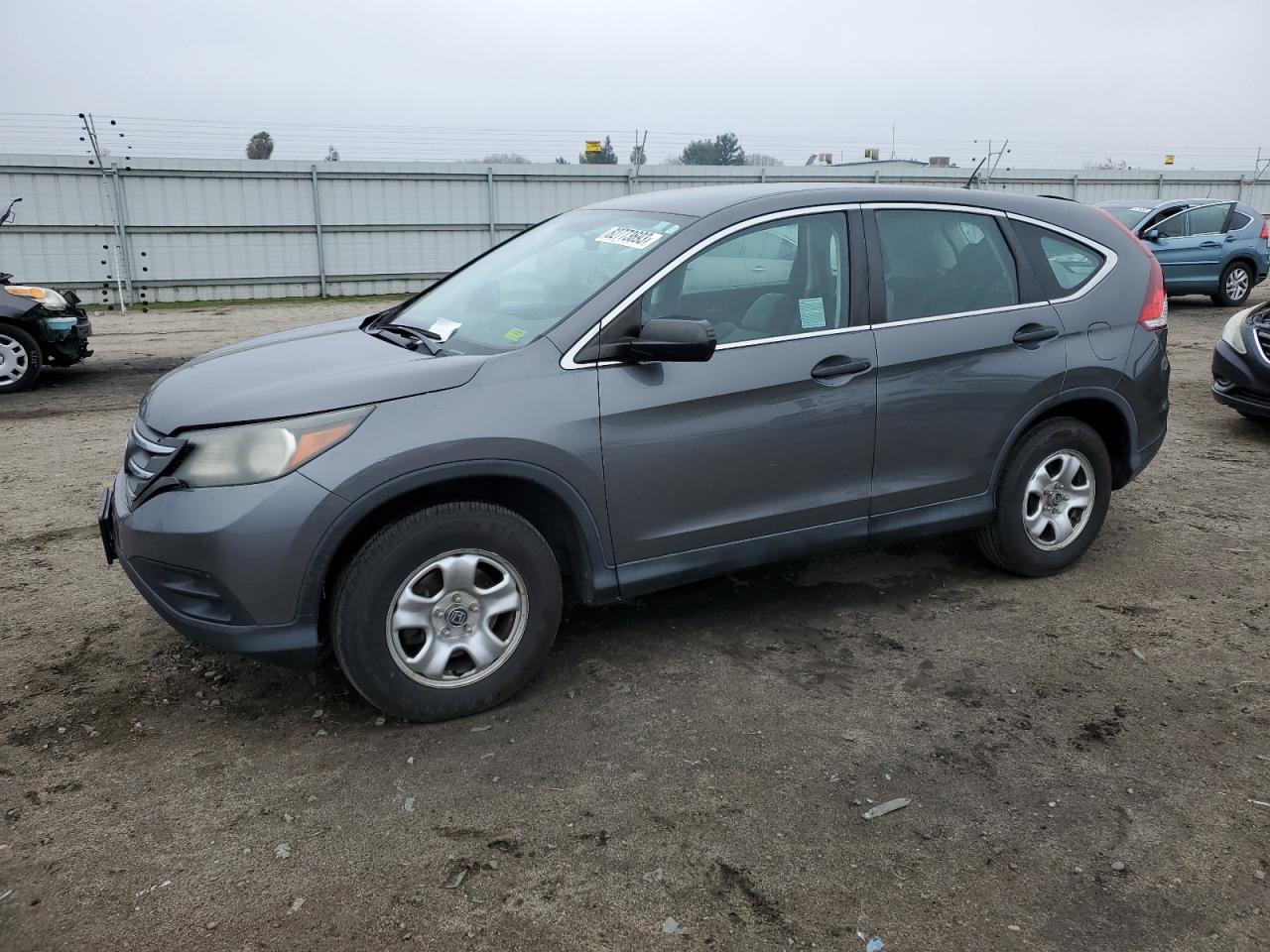Obraz 1 z 2014 HONDA CR-V LX 2014 z VIN 2HKRM3H34EH531059