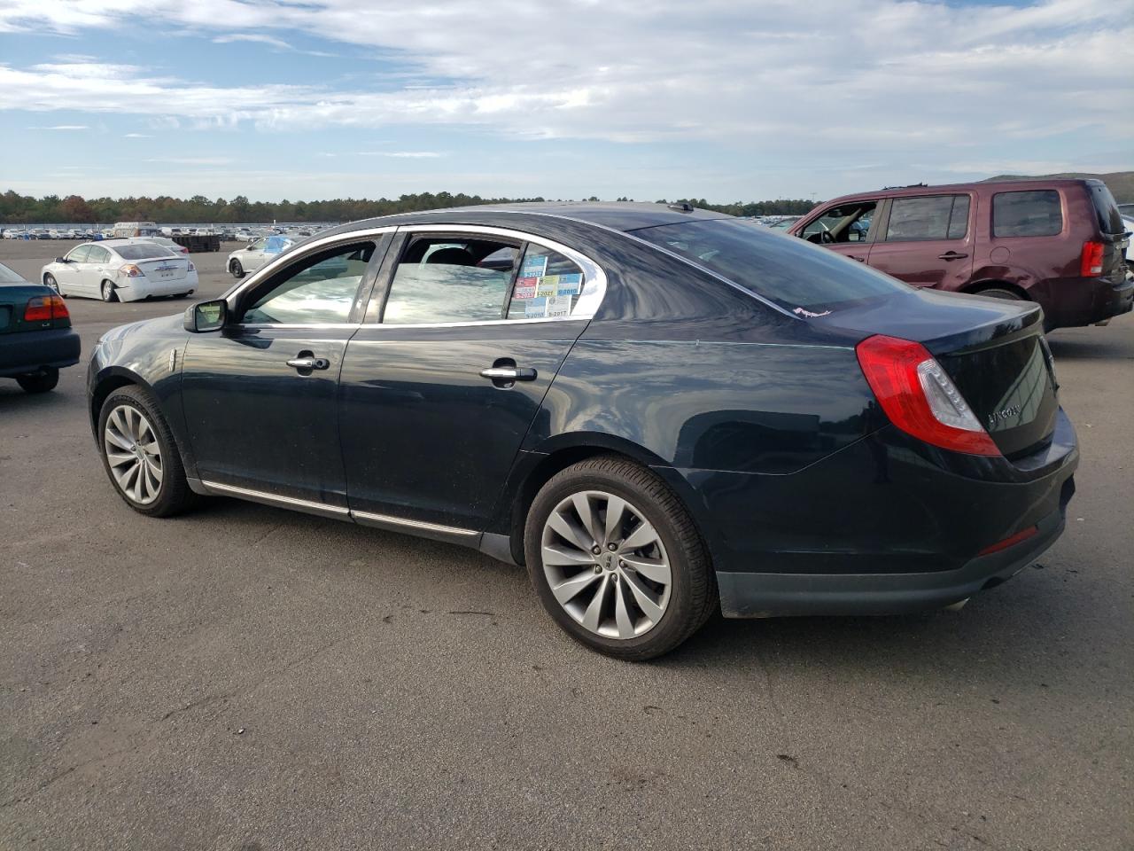 Obraz 2 z 2014 LINCOLN MKS  2014 z VIN 1LNHL9EK6EG601495