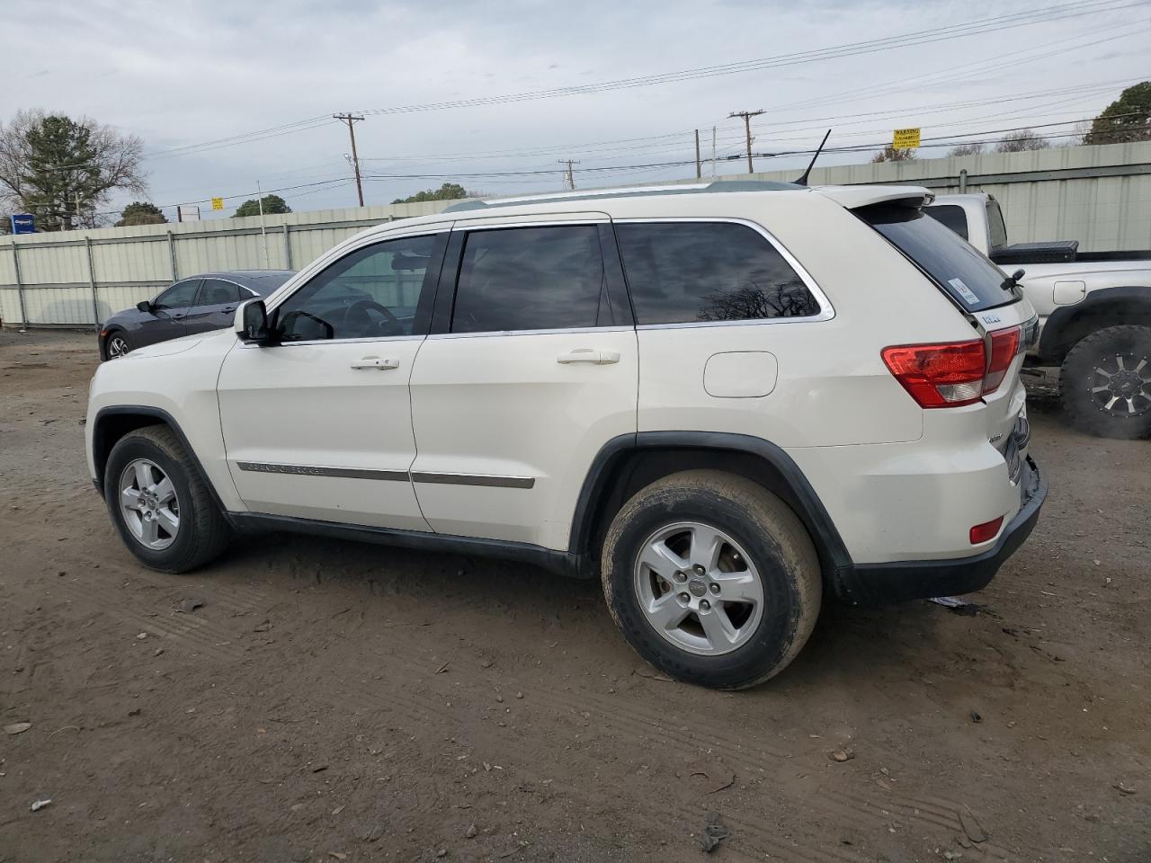 Image 2 of 2011 JEEP GRAND CHEROKEE LAREDO 2011 with VIN 1J4RS4GG5BC554481