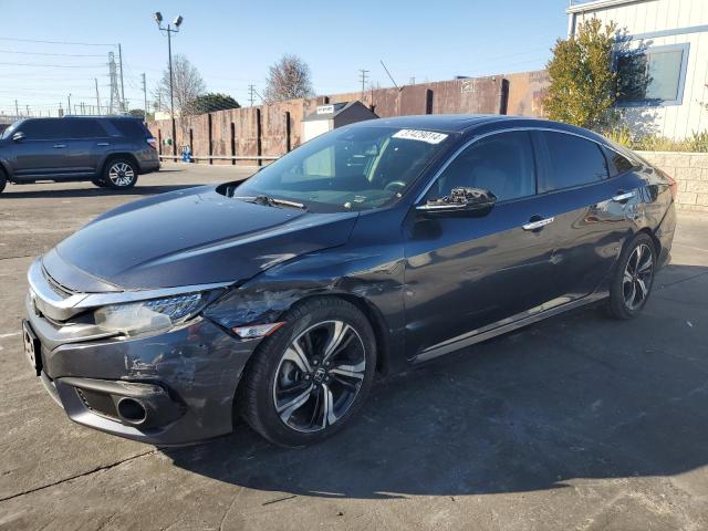 Image 1 of 2016 HONDA CIVIC TOURING 2016 with VIN 19XFC1F98GE219724