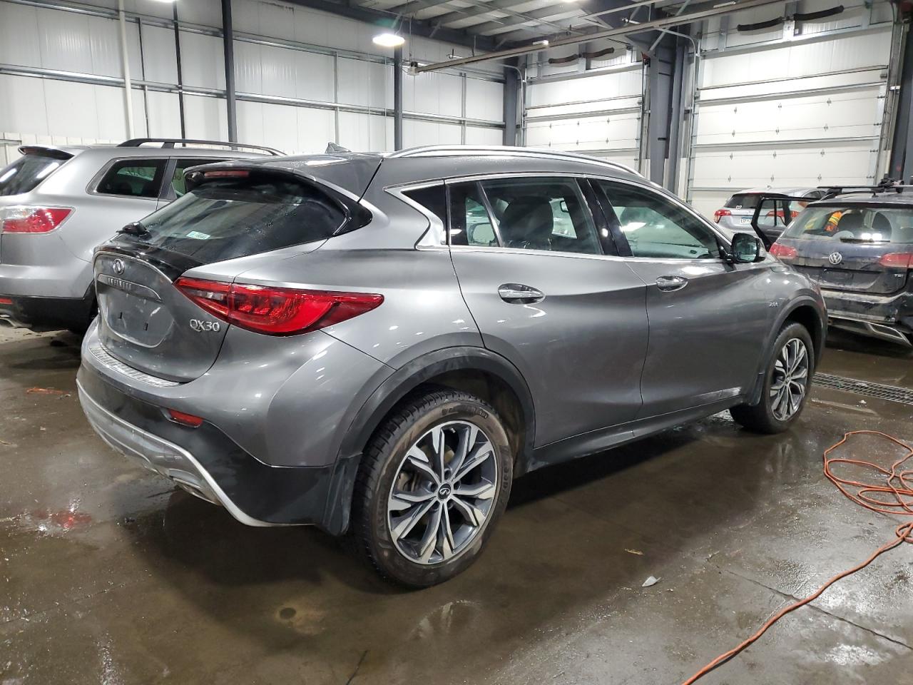 Image 3 of 2017 INFINITI QX30 BASE 2017 with VIN SJKCH5CR2HA022923
