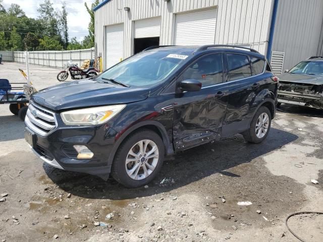 Image 1 of 2017 FORD ESCAPE SE 2017 with VIN 1FMCU0G90HUE63522